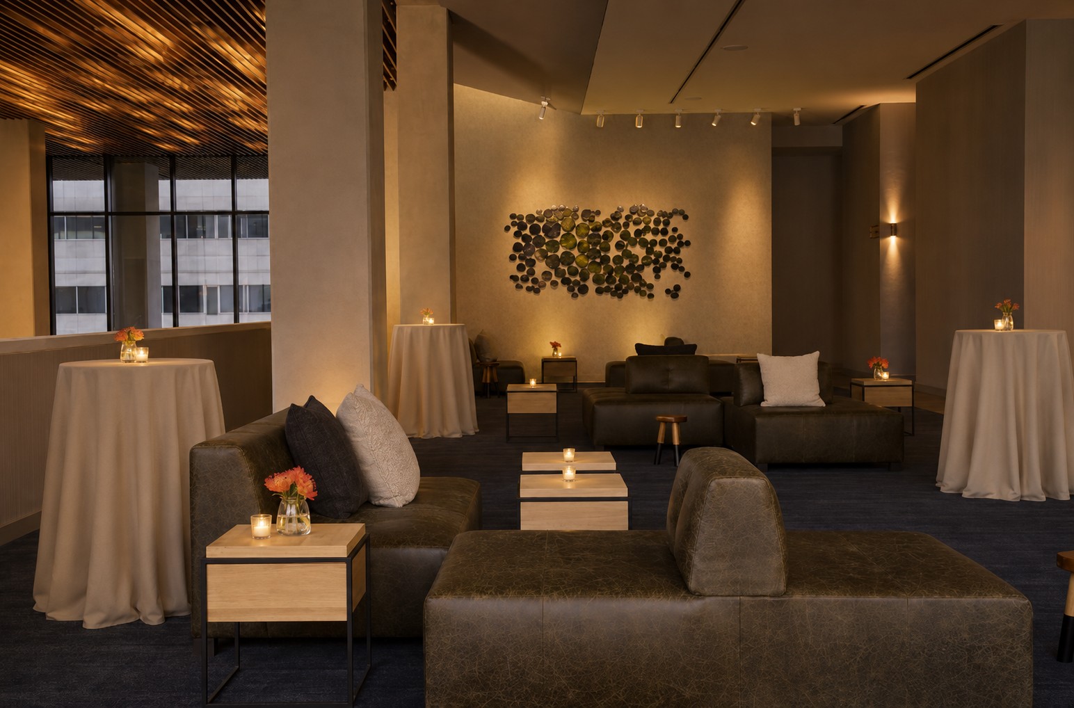 Candlelit lounge seating in the Magnolia prefunction space